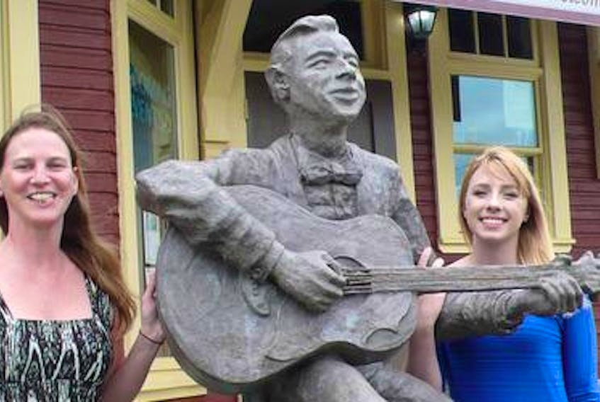 Kelly Inglis, manager of the Hank Snow Home Town Museum (left) and summer employee Rachel Foley, are busily getting ready to host the 28th annual Hank Snow Tribute in Liverpool, Aug. 16 to 19.