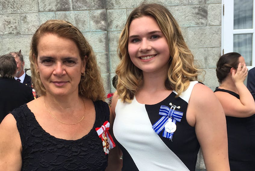 The Governor General of Canada Julie Payette poses with Stella Bowles after presenting her with a Meritorious Service Medal (Civil Division) in Quebec on July 6.