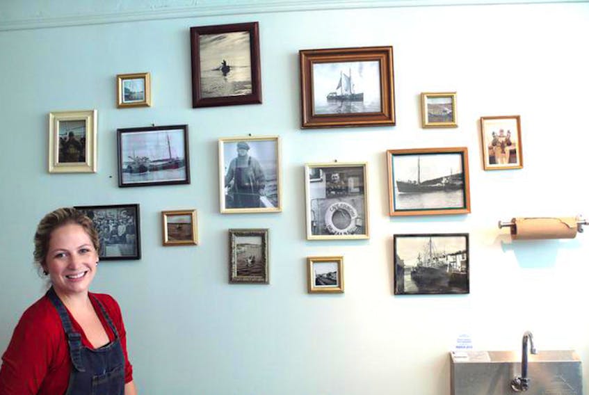 Heritage and tradition are important to Kelly Conrad, so she has established a “family wall” in her shop that features photographs of family members from many generations including her father, grandfathers and her husband, who are all involved in the fishing industry.