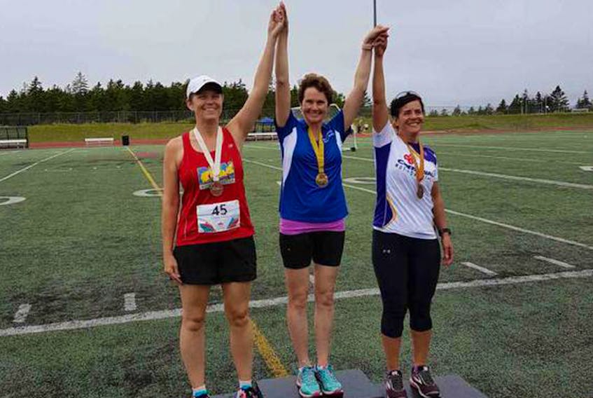 Lunenburg Mayor Rachel Bailey (middle) is shown with her gold medal at the 2018 Canada 55+ Games, which was held in Saint John, N.B. Aug. 21 to 24.