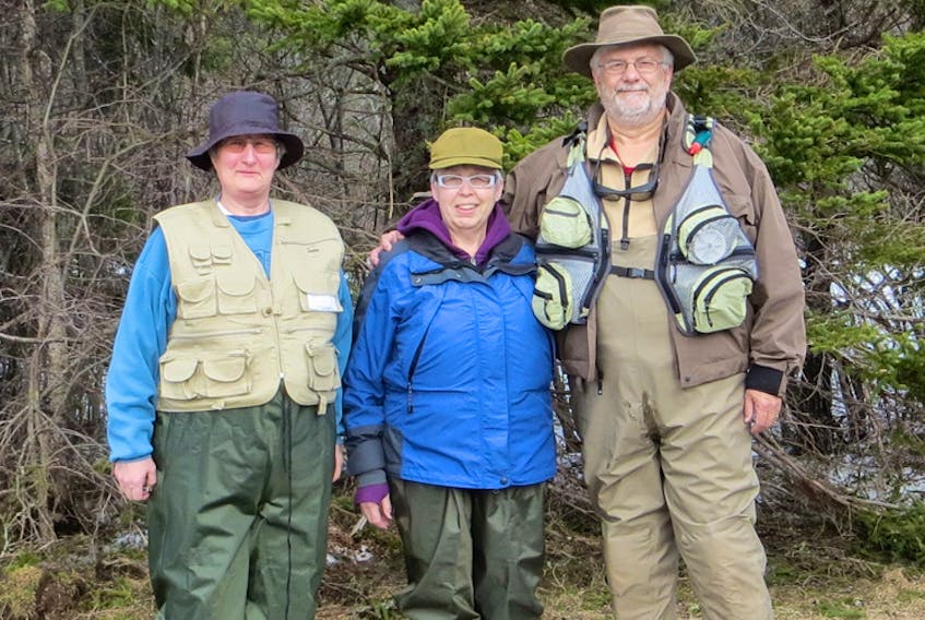 From right to left: Carroll Randall, his wife Dawn Randall and their friend Brenda Robertson are geared up and ready to head to the Margaree River Salmon Pools.