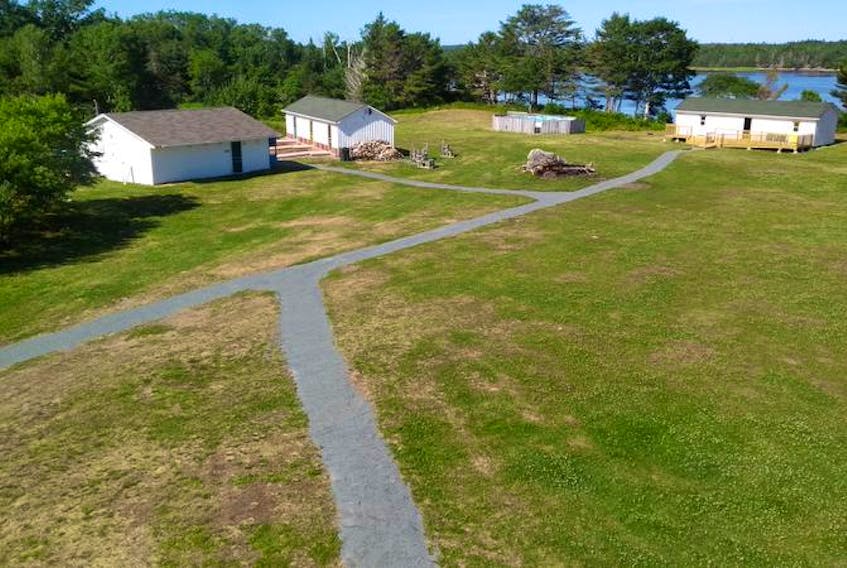 This bird’s-eye view of Camp Jordan shows the new gravel pathways and wheelchair-accessible ramps that were added to camp buildings.