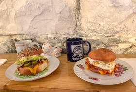 Breakfast sandwiches piled high with local ingredients and housemade sauces at the main event at brunch at Toslow in downtown St. John’s.