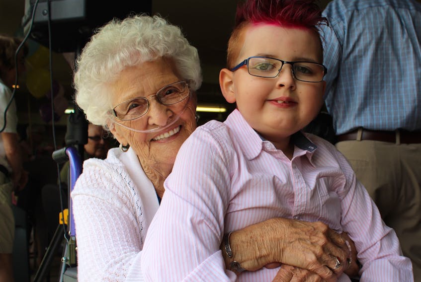 A boy’s wish came true on Saturday afternoon. Leeland Hill, 9, met his great grandmother, Betty Thorne, 90. Leeland was recently diagnosed with focal pontine/mid-brain high grade glioma, a terminal brain condition. The Children’s Wish Foundation granted him a wish, and his was simple: to meet his great-grandmother. He travelled with his family from Dartmouth, N.S. to throw a “pretty party” for his “Great Granny” at Admiral’s Coast Retirement Centre in Kelligrews. Family and friends gathered at a reception room decorated with balloons and flowers. There was live music, dancing, and plenty of food. Leeland and Thorne embraced when they met, then sat side-by-side while they were greeted by party-goers, many of whom brought gifts. Leeland said he felt excited and happy to finally meet his Great Granny. Thorne smiled and said she felt overwhelmed. “I couldn’t get over it because there are so many things he could wish for,” she said.
