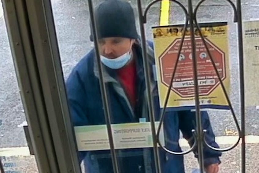 A photo, released by the RNC from security camera footage, shows the man believed to have held up The Medicine Shopper pharmacy at 470 Topsail Road Friday morning.