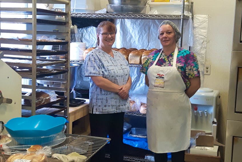 When the Bell Island mines closed in 1966, the island’s population plummeted, and so too did the jobs. But with a cup of flour and a sprinkle of hope, a bakery owned by several hundred shareholders created the first four permanent jobs in the small community since the mines closed. Pictured are Claudine Newell (left), head baker at Rolling Pin Bakery, and Sharon Byrne, assistant baker.