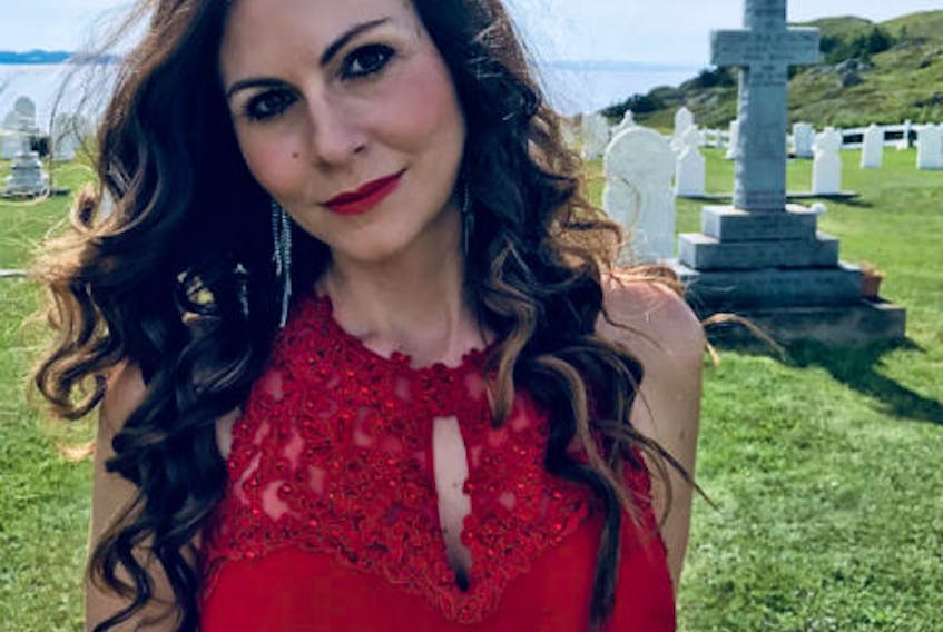 Tonia Evans Cianciulli is a big fan of Georgina Stirling, Newfoundland’s first opera singer who toured all over the world under the stage name of Marie Toulinquet who was from Twillingate and is buried there. Cianciulli poses in front of her monument in the graveyard in Twillingate. Submitted