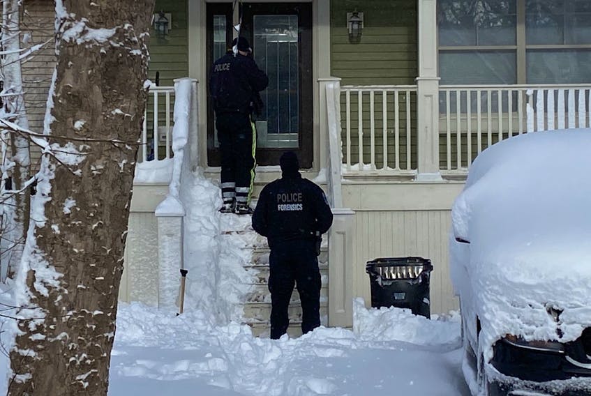 Royal Newfoundland Constabulary officers investigate an incident involving shots fired at 40 Craigmillar Avenue in St. John's early Friday morning. It's the same residence where 47-year-old Jamie Cody last summer.