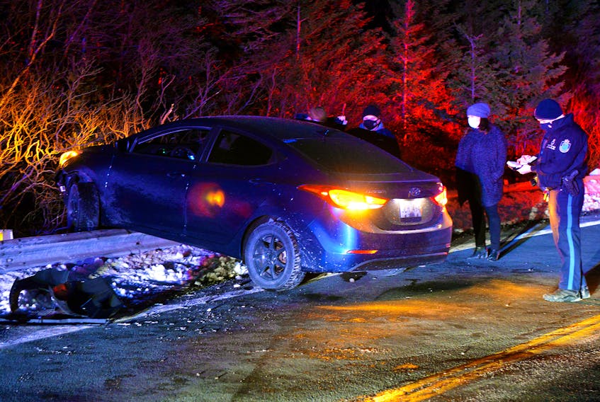 No one was injured after a car crashed over a guardrail on the road to Cape Spear late Saturday night. Keith Gosse/The Telegram