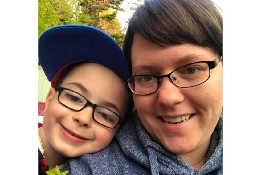 Jennifer Toope and her seven-year-old son, Ryder, of Mount Pearl are two of many people who hope the programs at Max Athletics are back up and running soon after a fire there early Thursday morning forced its closure.