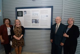 In an emotional gathering Thursday at Memorial University's University Centre, a storyboard was unveiled in memory of Judy Lynn Ford, a MUN biology major who was killed while crossing Prince Philip Drive on Oct. 17, 1980. Ford, 20, from Port aux Basques, was living in the student residence at Paton College. She was struck by a dumptruck, and her death precipitated a nearly week-long student and citizen protest and occupation of the parkway that ultimately led to the construction of two pedways spanning the road. The storyboard was unveiled by her parents, Rodney and Ida Ford, who still live in Port-aux-Basques and came to St. John’s for the event. Also in attendance were Judy Lynn’s sisters, Linda Spencer (left), of Port aux Basques, and Rhonda Whitten of Corner Brook.