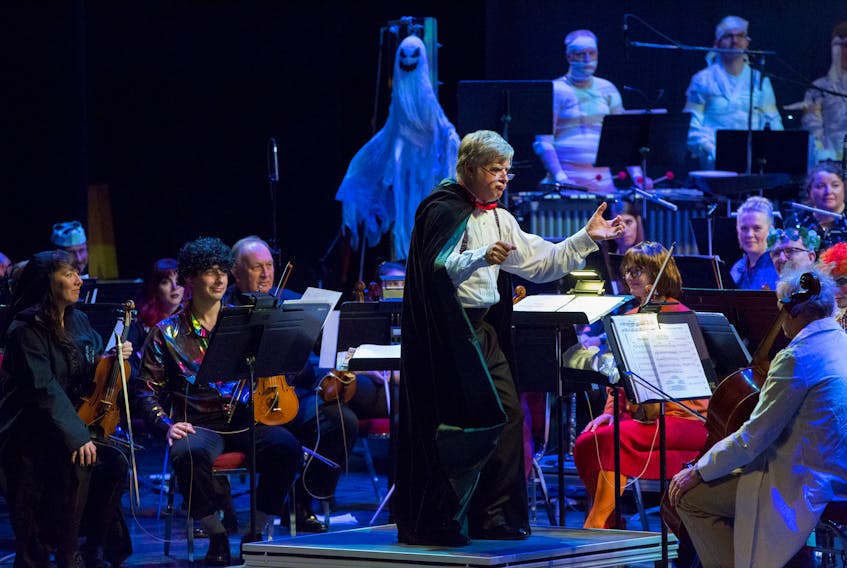 Marc David, dressed as Dracula, conducts the Newfoundland Symphony Orchestra on Friday during the NSO’s celebration of Halloween.