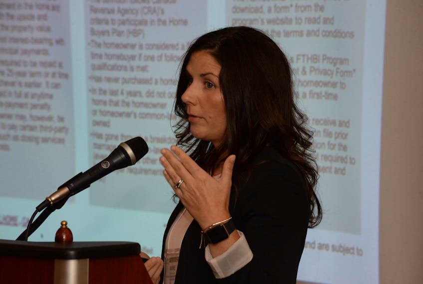 Anne Norwood of the Canada Mortgage and Housing Corp. speaks about the CMHC’s First Time Home Buyer Program Tuesday at the Airport Comfort Inn in St. John's during the Newfoundland and Labrador branch of the Canadian Home Builders Association's monthly membership meeting.