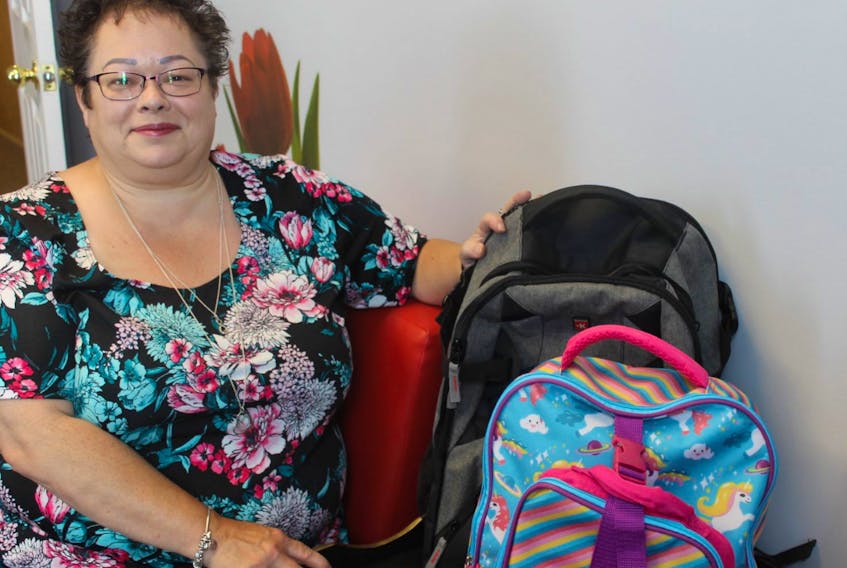 Elaine Balsom is the executive director of Single Parents Association, a non-profit organization that helps low-income, single parent families. One of the programs it offers is the Back to School project, where donated school supplies are giving  to clients of the association. These backpacks are being sent to a mother and daughter heading back to school in Marystown.