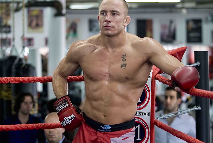 Georges St-Pierre, shown in this file photo, holds the UFC record for most wins in title bouts, including nine straight from 2008 to 2013. — File/John Mahoney/Postmedia