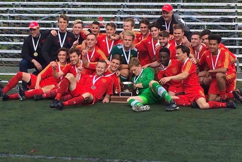 The Holy Cross Kirby Group Crusaders struck a familiar championship pose last year at King George V Park in St. John’s after winning their eighth Johnson Challenge Cup title in 10 years. The Crusaders are the No. 1 seed heading into today’s provincial men’s soccer championship, beginning today at Centennial Field in St. Lawrence, with their first opponents being their capital-city rivals, the second-place Stavanger Dental Feildians. — NLSA/Twitter