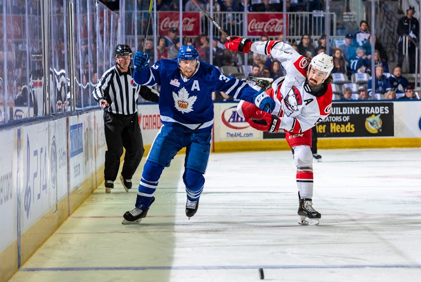 Colin Greening, left, played 10 years in the professional hockey ranks, including the last three with the Toronto Marlies, helping the team to the 2018 Calder Cup AHL championship. Greening, 33, is retiring, but that doesn’t mean he won’t be busy. The St. John’s native is entering Harvard University’s School of Business in the fall. — Toronto Marlies photo