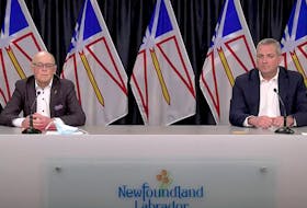 Provincial cabinet ministers John Haggie (left) and Gerry Byrne held a virtual media briefing Thursday to provide what they say is clarity to the issue of a PET scanner at the new hospital in Corner Brook. — YouTube/Screenshot