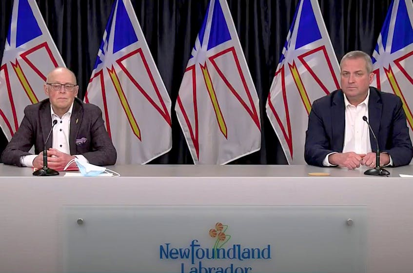 Provincial cabinet ministers John Haggie (left) and Gerry Byrne held a virtual media briefing Thursday to provide what they say is clarity to the issue of a PET scanner at the new hospital in Corner Brook. — YouTube/Screenshot