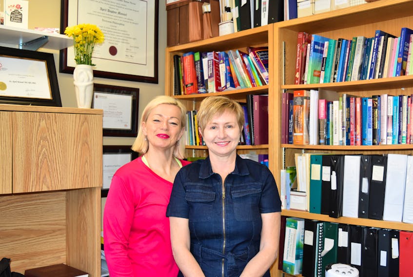 April Pike (left) and Karen Parsons are part of a research team studying the need for support services to aid people experiencing memory loss who are likely in the earliest stages of dementia.