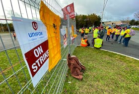 Striking Dominion workers gather on a picket line and for a rally Thursday morning at the Loblaw Companies Ltd. distribution centre in Mount Pearl. Keith Gosse/The Telegram