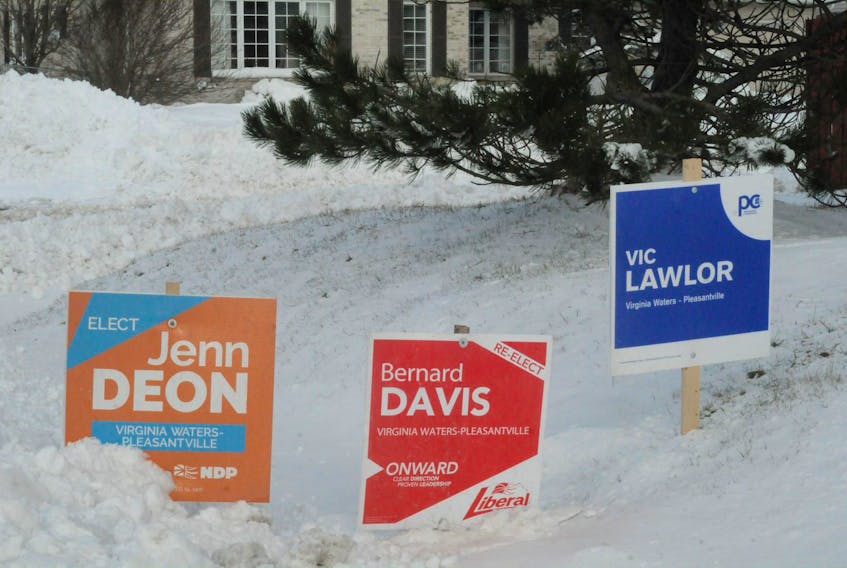 Election signs like these ones in the electoral district of Virginia Waters-Pleasantville will remain up as campaigning in 18 provincial districts is being allowed to resume after Saturday. Virginia Waters-Pleasantville is one of the 18 districts on the Avalon Peninsula that has had in-person voting — which was to have taken place Saturday — delayed until an unspecified future date because of the COVID-19 outbreak in the metro St. John's region. In-person voting in the province's other 22 districts will take place as scheduled Saturday.
