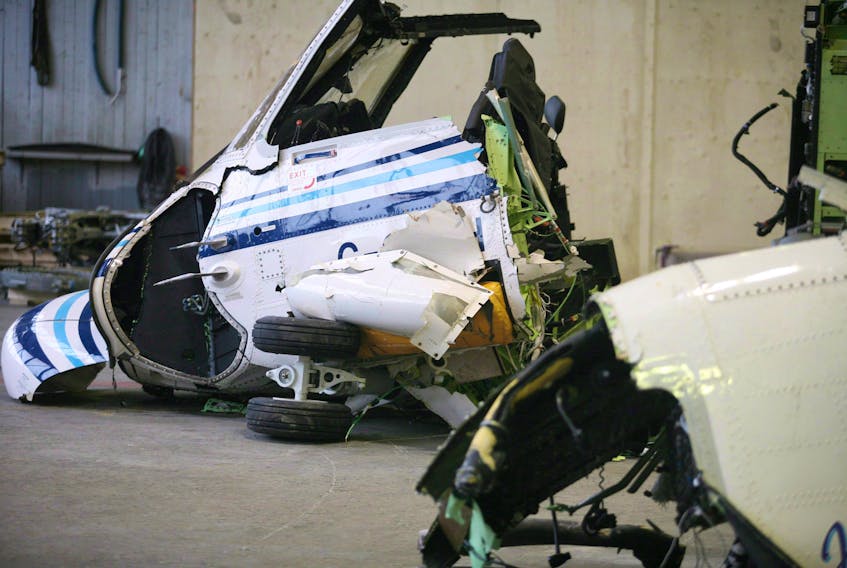 The wreckage of the Cougar Helicopter flight 491 is displayed to the media as the Transportation Safety Board reports on its findings, in St. John’s March 26, 2009.