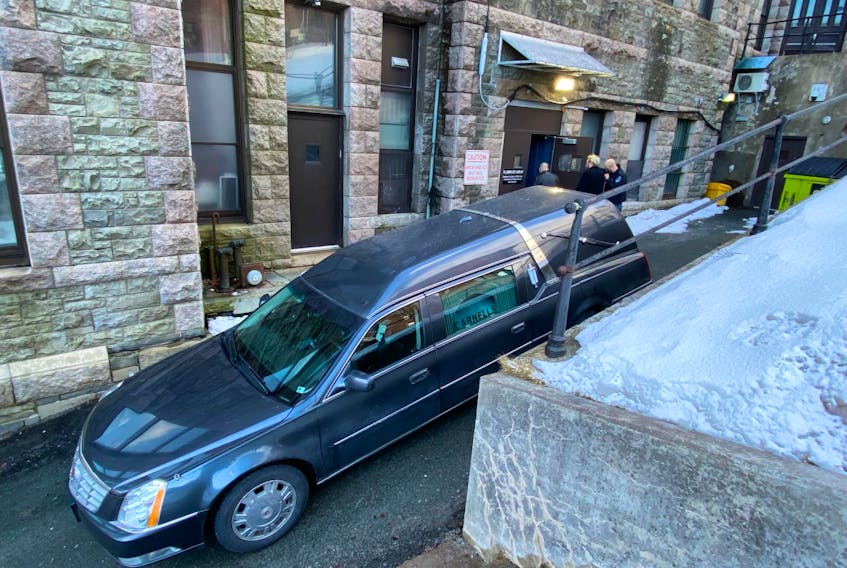 A hearse is parked in the laneway next to the lock-up located in the building housing the Newfoundland and Labrador Supreme Couty in St. John's — Keith Gosse/The Telegram.