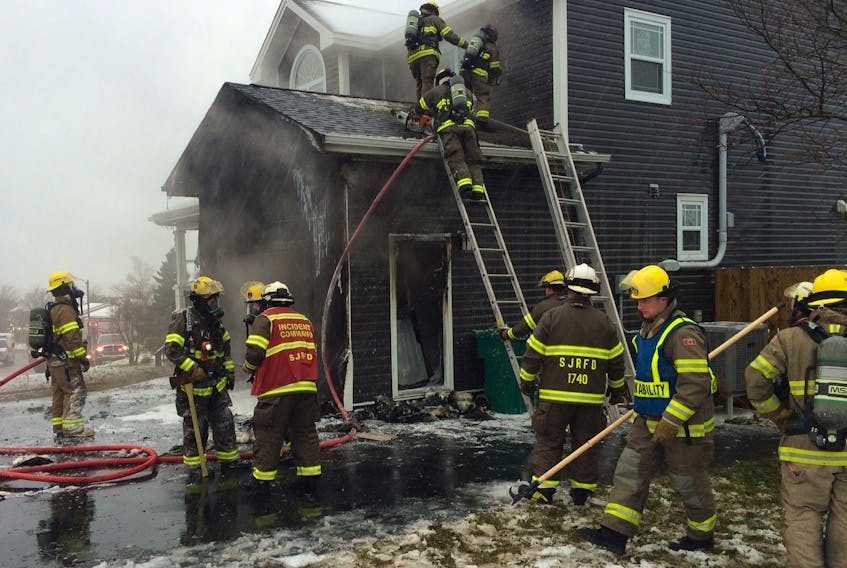 Firefighter's from various stations of the St. John's Regional Fire Department battled a house fire in nasty weather conditions in the Shea Heights area of St. John’s today. Joe Gibbons/The Telegram