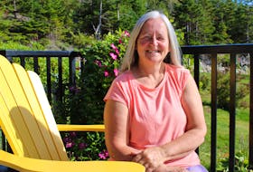 Mary Louise Snow loves her home province of Newfoundland. That love brought her back here to pursue a career, start a family and build a life and a home in C.B.S. She sits on her deck recently enjoying the grounds and admiring her garden while doing an interview for this 20 Questions feature.