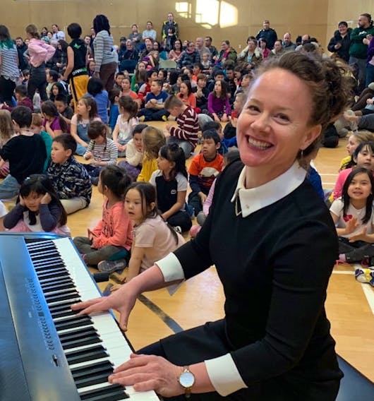 Mary Piercey-Lewis leads an assembly at Joamie Elementary School in Iqaluit. — PHOTO COURTESY OF MARY PIERCEY-LEWIS