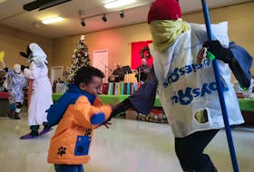 New Canadians were treated to a jig by a group of mummers made up of staff from the Association for New Canadians at the associations St. John's offices Thursday.