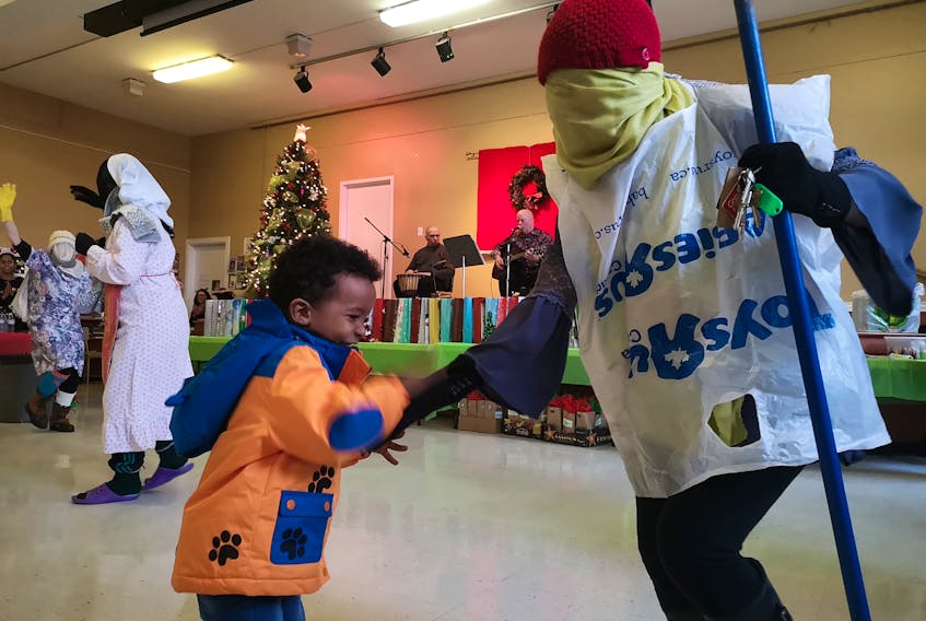 New Canadians were treated to a jig by a group of mummers made up of staff from the Association for New Canadians at the associations St. John's offices Thursday.
