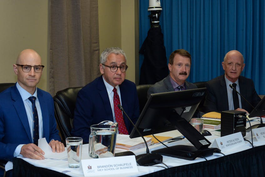 From left, professor Brandon Schauflele of the Ivey School  of Business, Newfoundland Power president Peter Alteen, Newfoundland and Labrador Hydro manager of rates and regulation Kevin Fagan and Consumer Advocate Dennis Browne at the Muskrat Falls Inquiry in St. John’s on Tuesday.