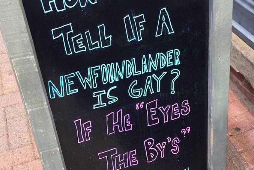 This sign from Twitter shows a sandwich board outside Charlottetown, PEI, restaurant Terre Rouge, asks "How do you tell if a Newfoundlander is gay."