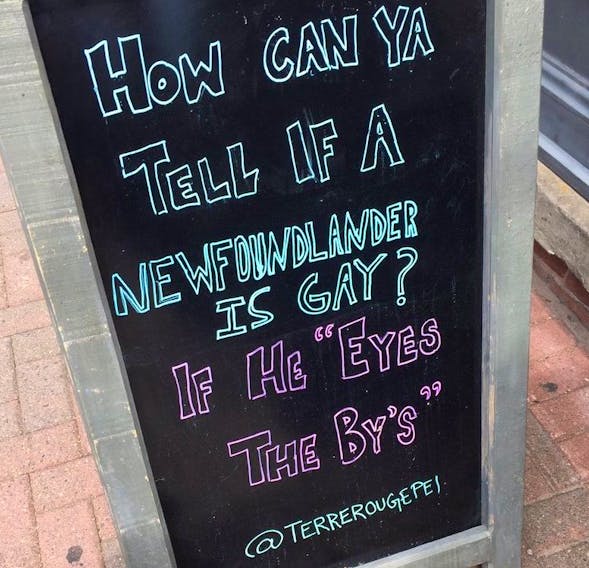 This sign from Twitter shows a sandwich board outside Charlottetown, PEI, restaurant Terre Rouge, asks "How do you tell if a Newfoundlander is gay."