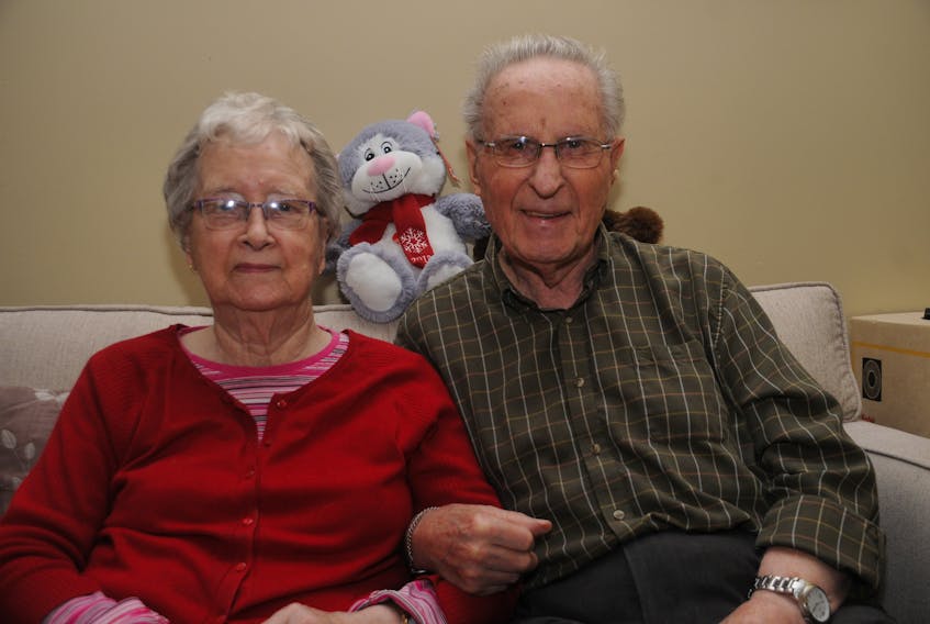 A new puzzle is a nice Christmas gift for Clara and Irving Wareham, a Carbonear couple who now live at Meadow Creek in Paradise. ANDREW ROBINSON/THE TELEGRAM