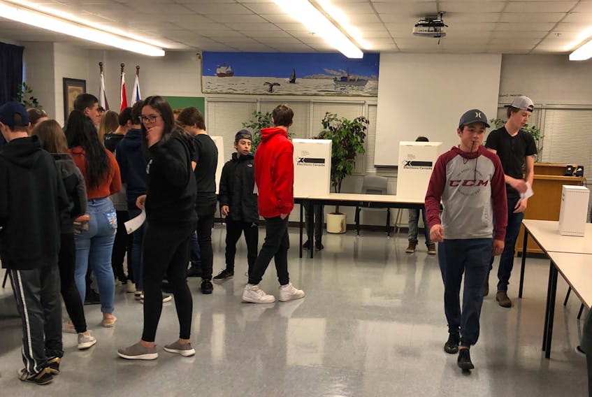 Students at St. Kevin’s Senior High School hold a student vote at the school on Friday. Results of the Canada-wide student vote will be released later today. Contributed