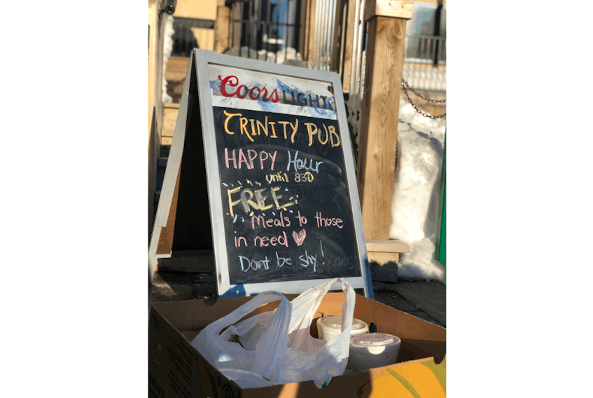 Gillian Phillips contacted the owner of Trinity Pub, Bernie Manning, to see if he’d be interested in making the bar a pickup point for people in need of free meals on Saturday. He thought it was a great idea.