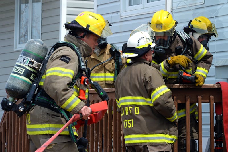 Four people escaped a St. John's house fire Saturday afternoon and are now displaced from the home. Keith Gosse/The Telegram