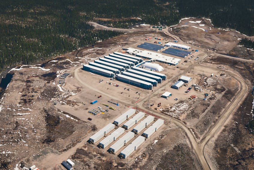 Accommodations at the Muskrat Falls work site, in its entirety. The area is actually made up of three, separate camp areas. The eight buildings in the foreground are a single complex up for possible sale, while six buildings together further back in the photo are the second set of accommodations. The central, connected buildings, including the oval sports centre, are still in use and not on the table right now. — Nalcor photo