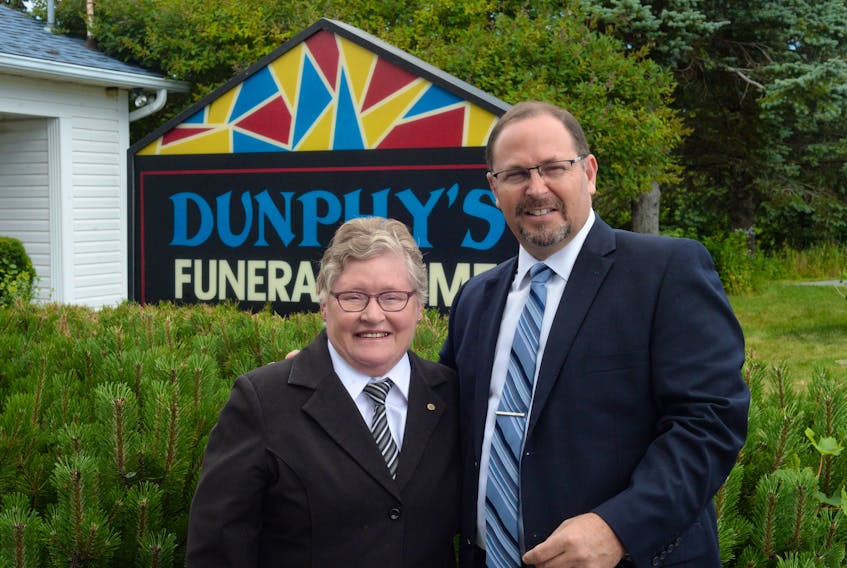 Barb Dunphy — the last of the family involved in the operation of Dunphy’s Funeral Home in Holyrood, is starting her semi-retirement. She’s sold the business to a new owner, Ron Fitzpatrick, who took over the funeral home as of Friday, Aug. 16. The owner of a funeral business out in Western Canada, Fitzpatrick sold off his facilities when the opportunity arose to move back home to St. John’s.