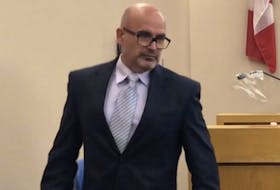 Elementary school principal Robin McGrath leaves the witness box in provincial court in St. John's Wednesday afternoon.