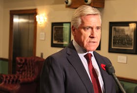 Premier Dwight Ball speaks with reporters about his Halloween meeting with Quebec Premier Francois Legault.