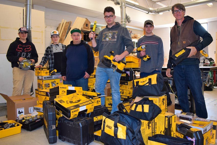 North Nova Education Centre was one of five schools in the province and the only one in Northern Nova Scotia to receive $10,000 worth of DeWalt tools that were left over from the National Skills Competition event held in Halifax recently. Pictured with the tools that will be put to use by the Pictou County high school students are from left: Eagan Kinney, Ryan Alexander, Ryen Jensen, Justin Blouin, Justin Fraser and building systems teacher Andrew Parsons.