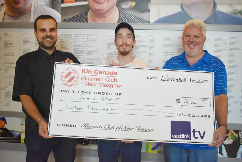 Fred El-Haddad, president Kinsmen Club of New Glasgow, presents a cheque for $16,000 to Summer Street's Luke MacPherson and Michael Corkum, president of Summer Street Foundation. Summer Street and Kinsmen have been in partnership for more than 40 years, El-Haddad said, and over that period have donated more than $1 million.