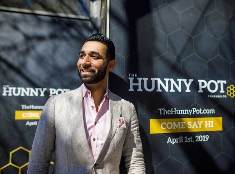 Hunny Gawri is shown outside his storefront in a recent file photo. The shop opens today.