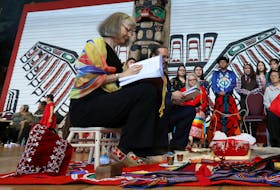 Chief commissioner Marion Buller prepares to hand over the final report during the closing ceremony of the National Inquiry into Missing and Murdered Indigenous Women and Girls in Gatineau. - Chris Wattie/Reuters