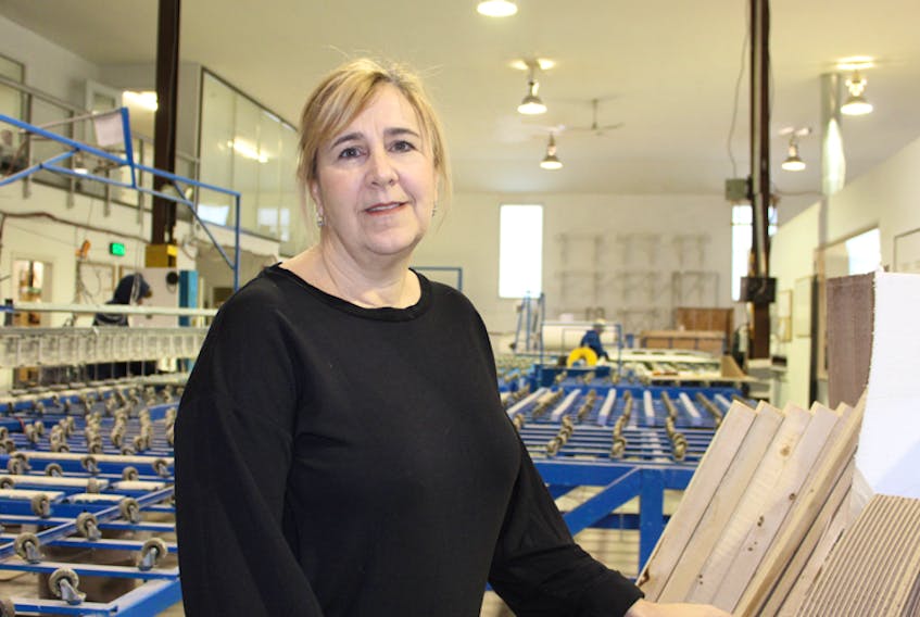 Michelle Milburn is chief operating officer of Advanced Glazings Ltd. in Sydney, N.S. She says her company, which manufactures and markets sustainable and commercially viable window technologies, is expected to do well in 2019. She said the only downside would be a possible slowing of the construction industry.