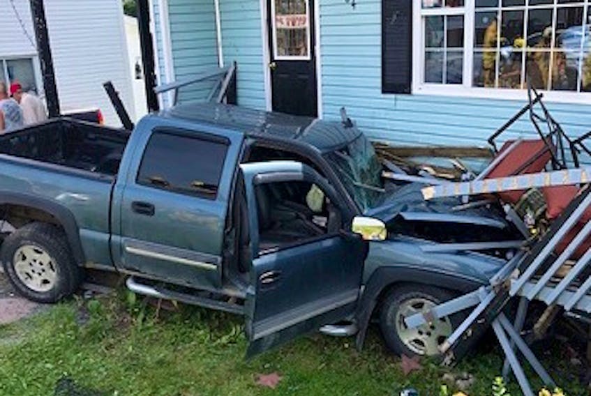 A pickup truck crashed into a home adjacent to the intersection of New Harbour Road and Route 70 in Spaniard’s Bay on Thursday, Aug. 2.